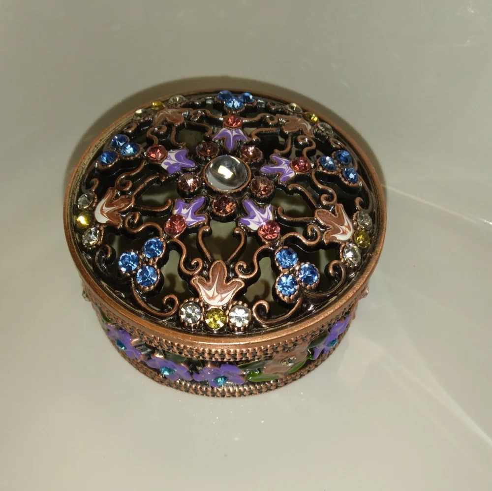 Elegant Bronze Jewelry Trinket with Purple Details